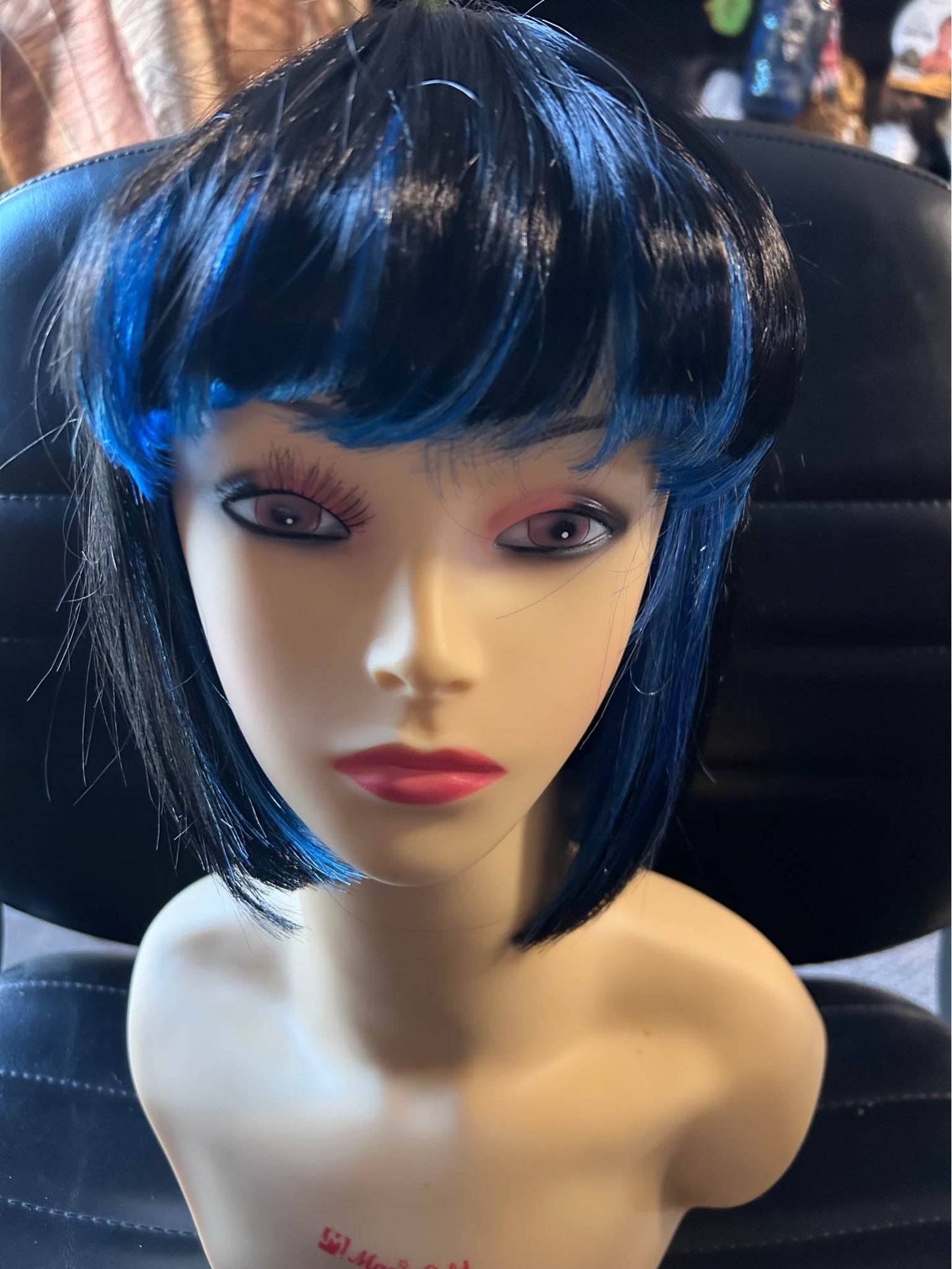 Roxanne-solid black with peek-a-boo blue bangs, bob style synthetic wig