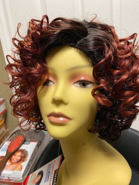 Fia- black, red, and copper blend, short to medium-length curly style, heat resistant synthetic wig
