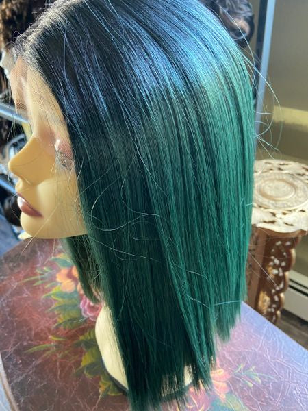 Glitter-black to dark green ombre layered cut with blunt ends with middle part lace front synthetic wig