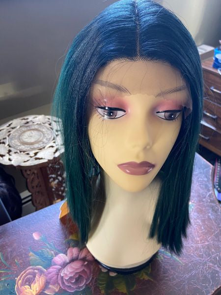 Glitter-black to dark green ombre layered cut with blunt ends with middle part lace front synthetic wig