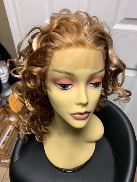 Claudia-strawberry blonde with plantium blonde highlights, medium length, spiral curls, full lace wig