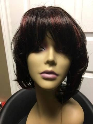 Ten- dark brown with burgundy highlights, chin-length layered bob synthetic wig